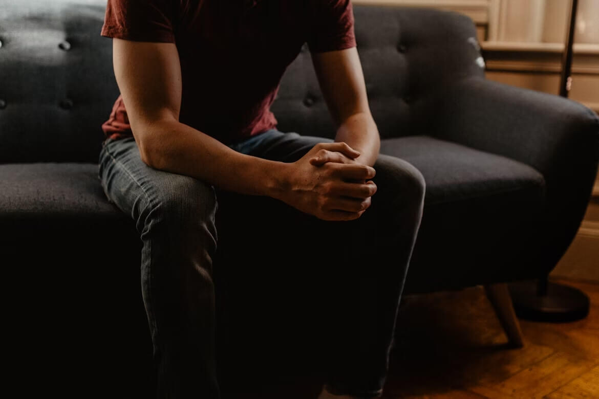 A person sitting on a couch