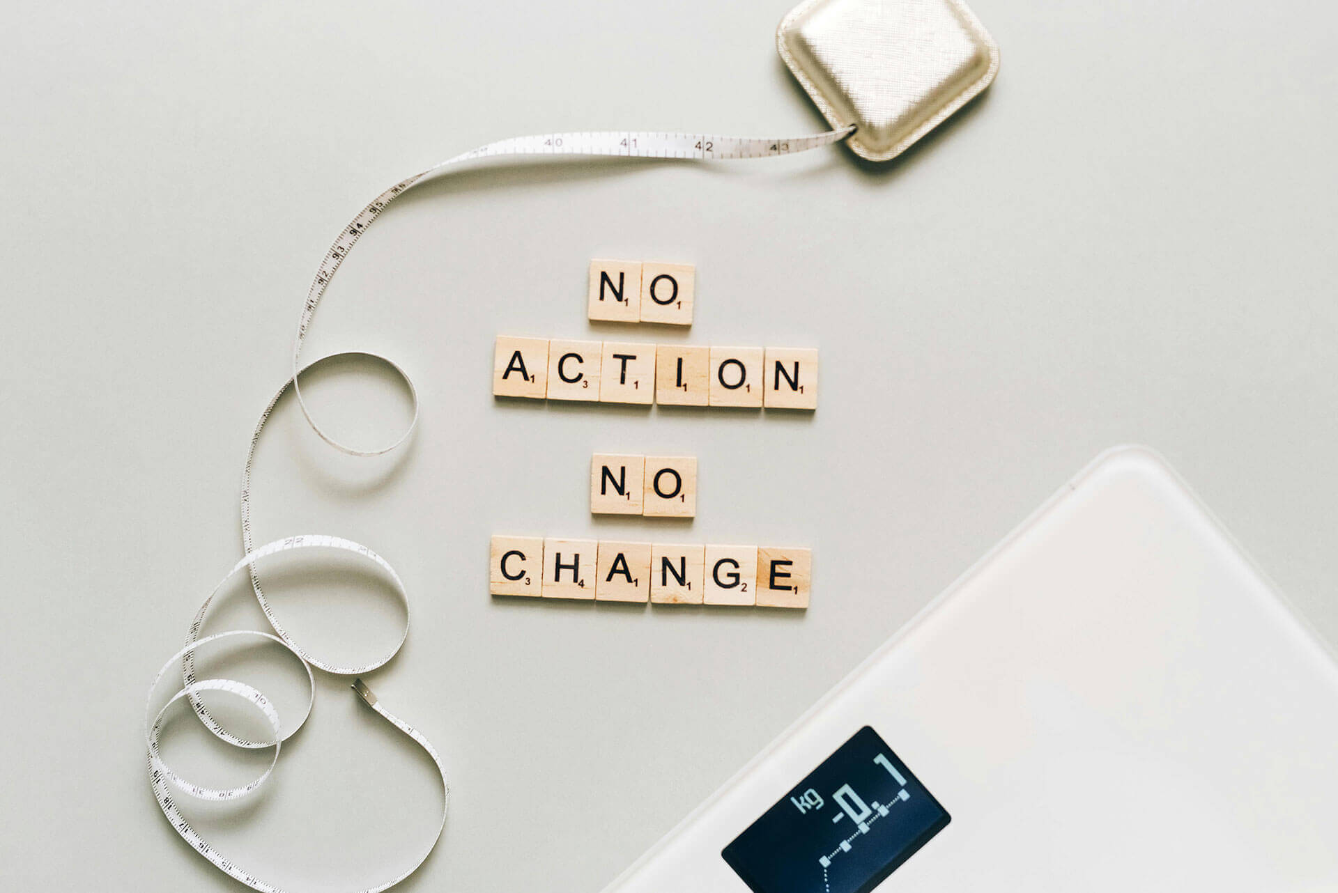 pexels-01 weight loss concept image - measuring tape, scale, and “no action, no change” message